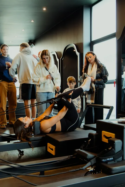 Nadia demonstrating on the reformer at the Vitális launch event