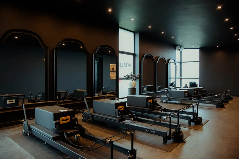 Inside Vit&aacute;lis Studios with reformer Pilates machines