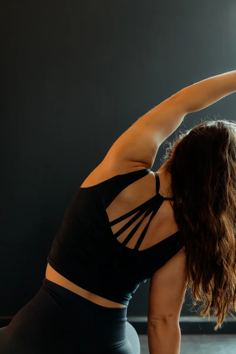 Nadia in reformer Pilates workout clothing