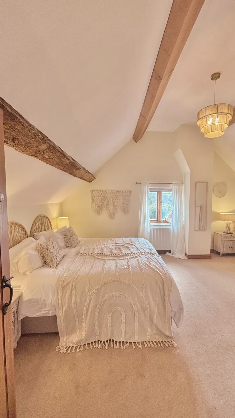 Upstairs bedroom with vaulted ceiling