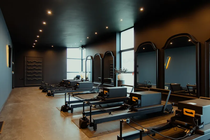 Wide view of the reformer studio at Vit&aacute;lis Studios in Newport